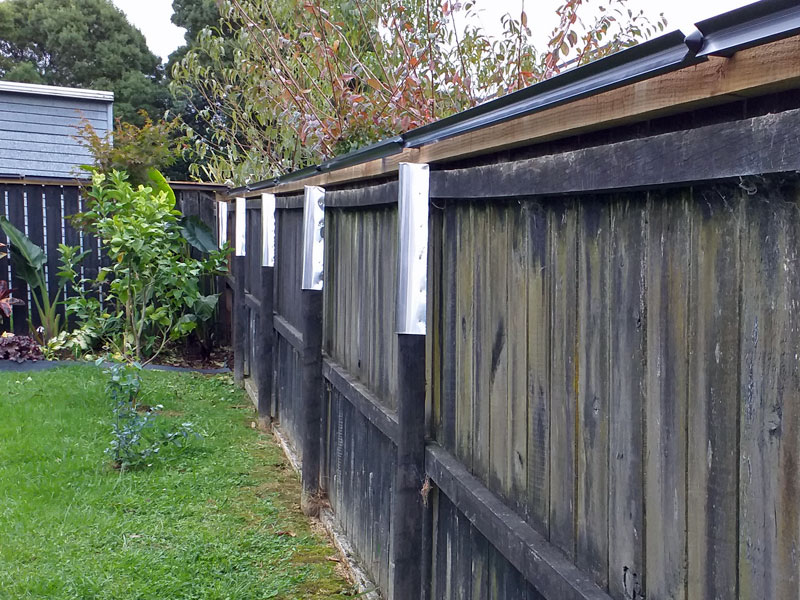 fence posts wrapped with aluminium