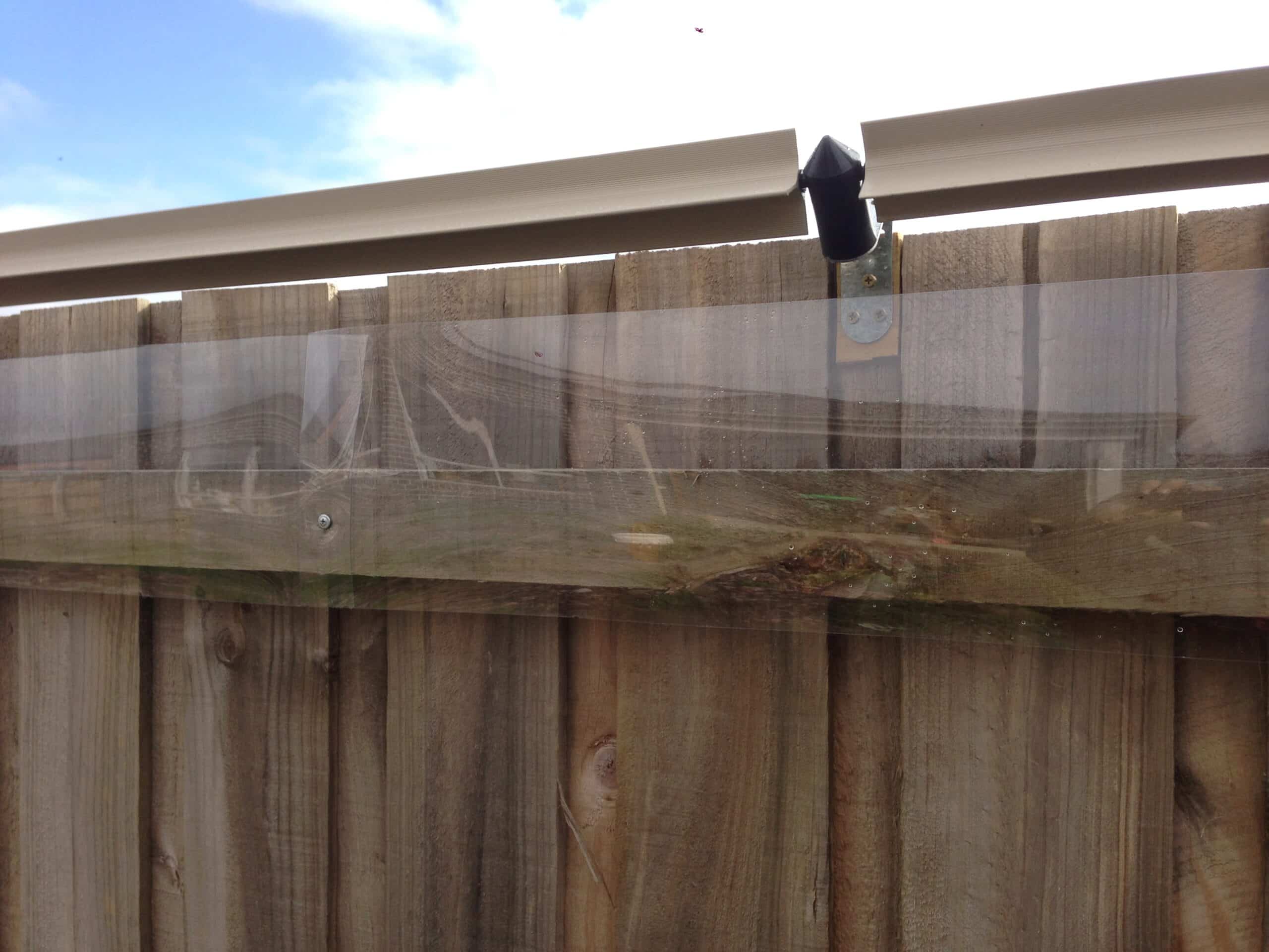 Oscillot cat fence system with offset brackets and acrylic on timber fence