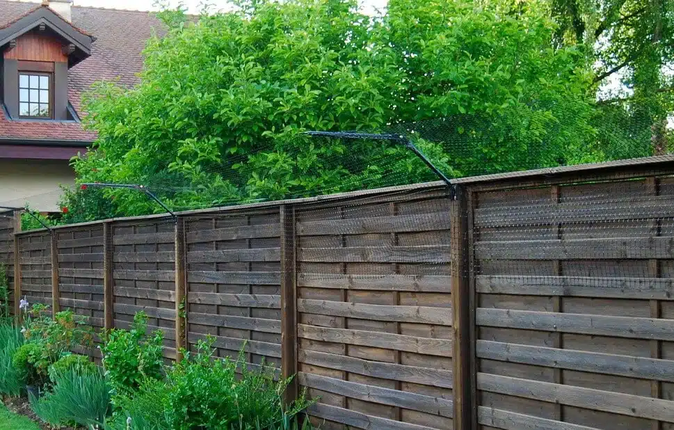 Purrfect Fence installed on a timber fence
