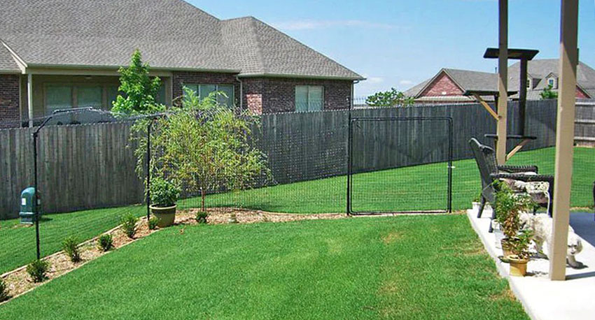 Purrfect Fence freestanding system within a yard